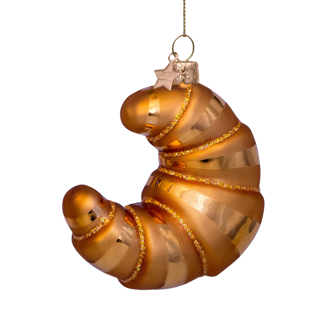 Glasornament formet som en croissant i mundblæst glas, gyldne og amberfarvede toner med guldglitter, fra Vondels